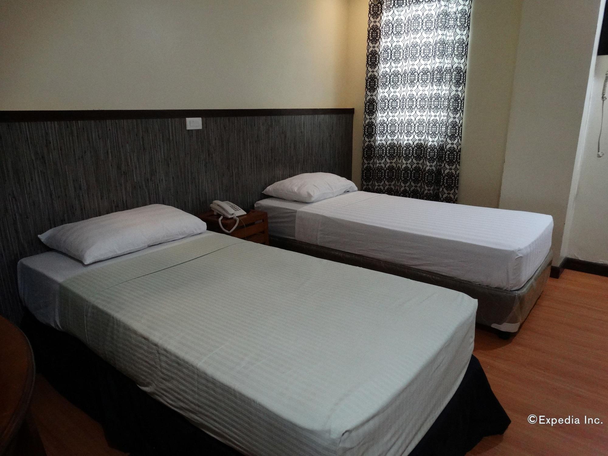 טאגבילראן סיטי Panda Tea Garden Suites מראה חיצוני תמונה