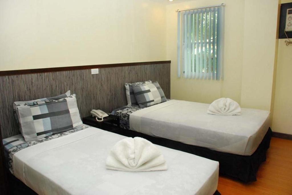 טאגבילראן סיטי Panda Tea Garden Suites מראה חיצוני תמונה