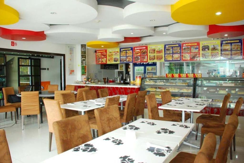 טאגבילראן סיטי Panda Tea Garden Suites מראה חיצוני תמונה